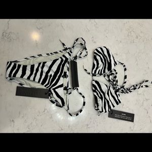 Triangl string bikini. NWT. Size small